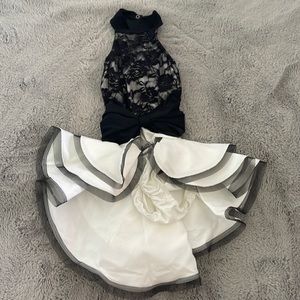 Black and white jazz costume with lace top, bow and ruffle skirt from Kellé